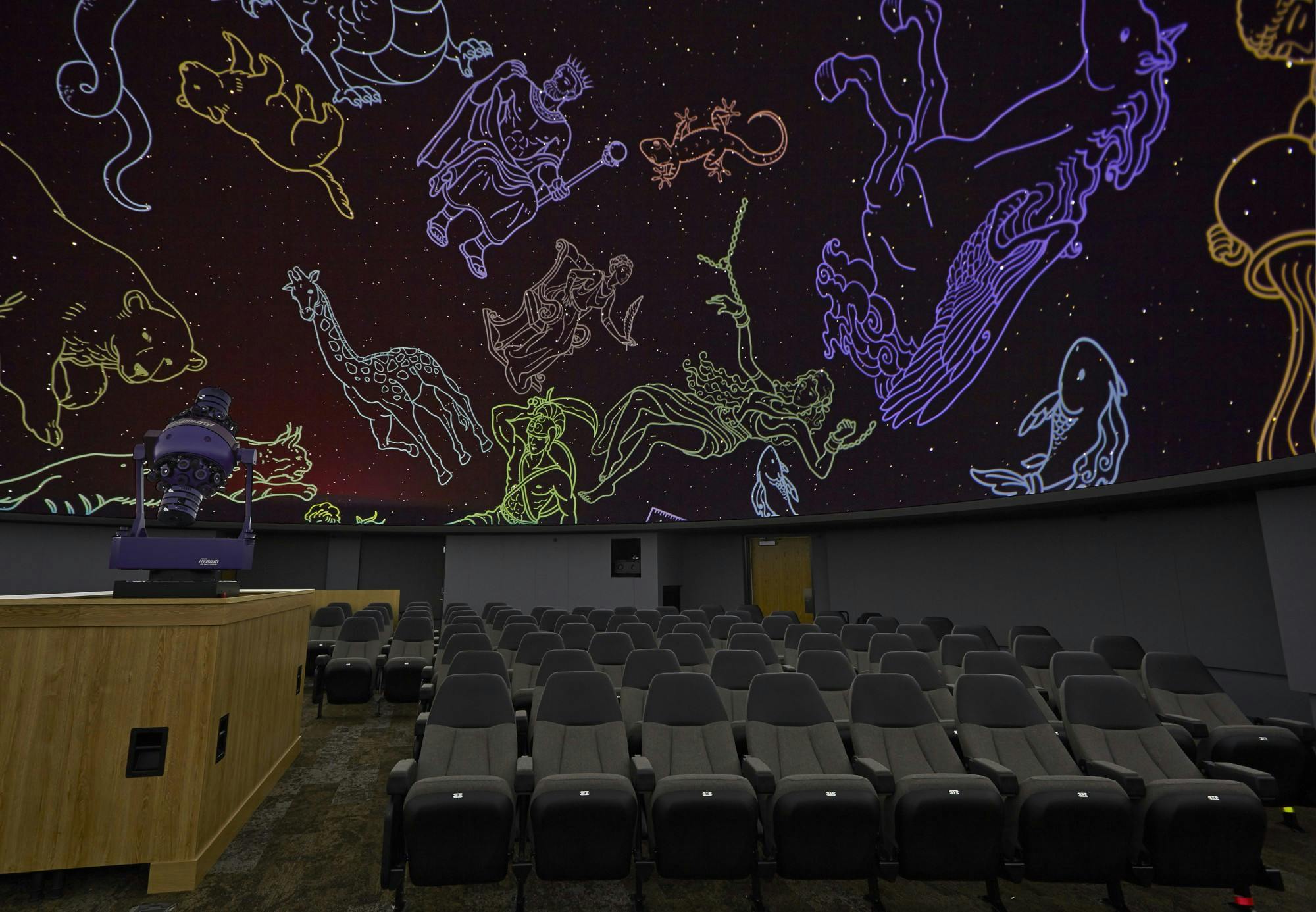 Constellations are projected onto the dome at the Charles W. Brown Planetarium. Planetarium Director Dayna Thompson shows the audience how to find the different patterns in the sky before and after each show. Charles W. Brown Planetarium, Photo Courtesy