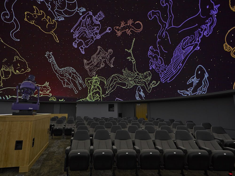 Constellations are projected onto the dome at the Charles W. Brown Planetarium. Planetarium Director Dayna Thompson shows the audience how to find the different patterns in the sky before and after each show. Charles W. Brown Planetarium, Photo Courtesy