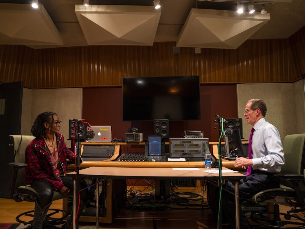 Ball State President Geoffrey Mearns and Grammy and Academy Award Winner Tiara Thomas record 
an episode of "Our Call to Beneficence" while Thomas was visiting Ball State. Thomas is a 2012 Ball State 
graduate. Logan Wood, Photo Provided
