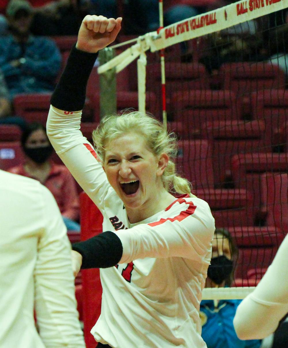 Graduate Student outside hitter Jaclyn Bulmahn (17) celebrates a kill against Ohio at Worthen Arena Oct. 1. Ball State is 13-3 for the season. Jacy Bradley, DN