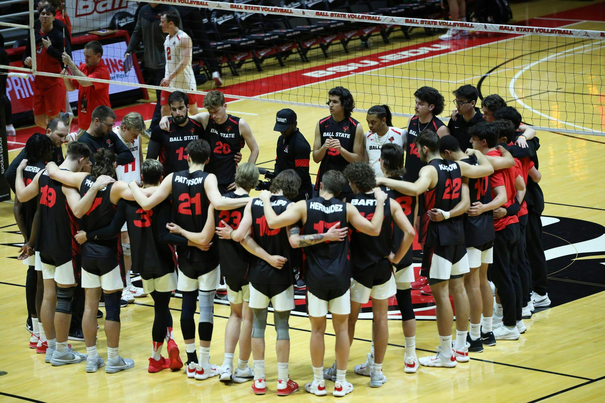 Ball State men's volleyball gathers to hear their coaches talk after their loss to Ohio State March 21 at Worthen Arena. The Cardinals lost 3-0 to the Buckeyes. Mya Cataline, DN