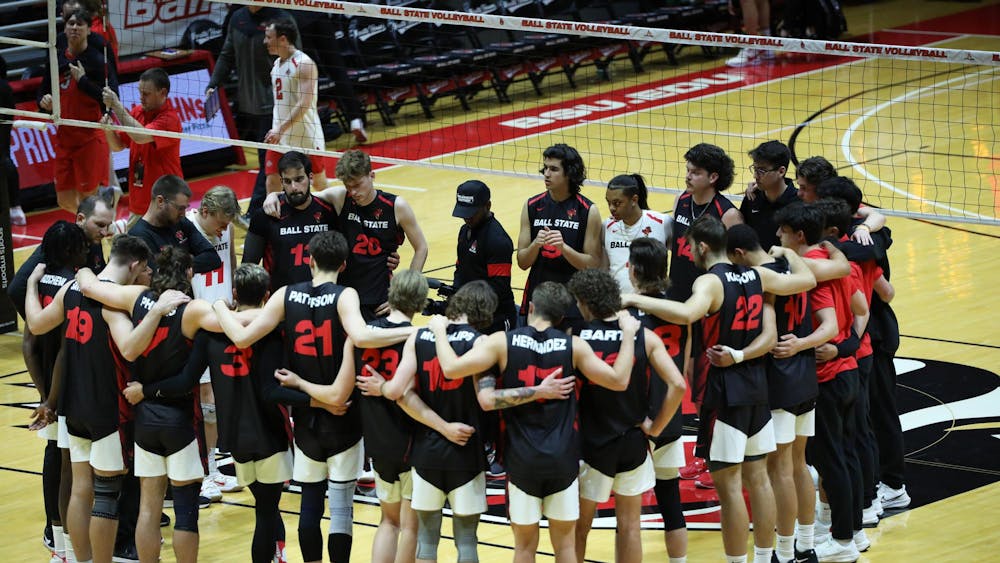 Ball State men's volleyball gathers to hear their coaches talk after their loss to Ohio State March 21 at Worthen Arena. The Cardinals lost 3-0 to the Buckeyes. Mya Cataline, DN
