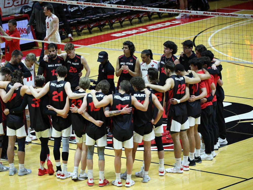 Ball State men's volleyball gathers to hear their coaches talk after their loss to Ohio State March 21 at Worthen Arena. The Cardinals lost 3-0 to the Buckeyes. Mya Cataline, DN