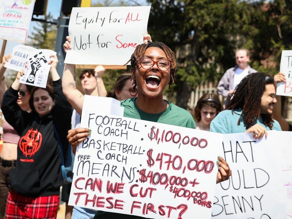 Student protesters march in protest of recent Ball State DEI cuts April 18 at Ball State University. Andrew Berger, DN