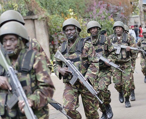 Soldiers arrive at the Westgate Mall on Saturday in Nairobi, Kenya. A gun battle inside the shopping center left several people dead after gunmen attacked one of the city