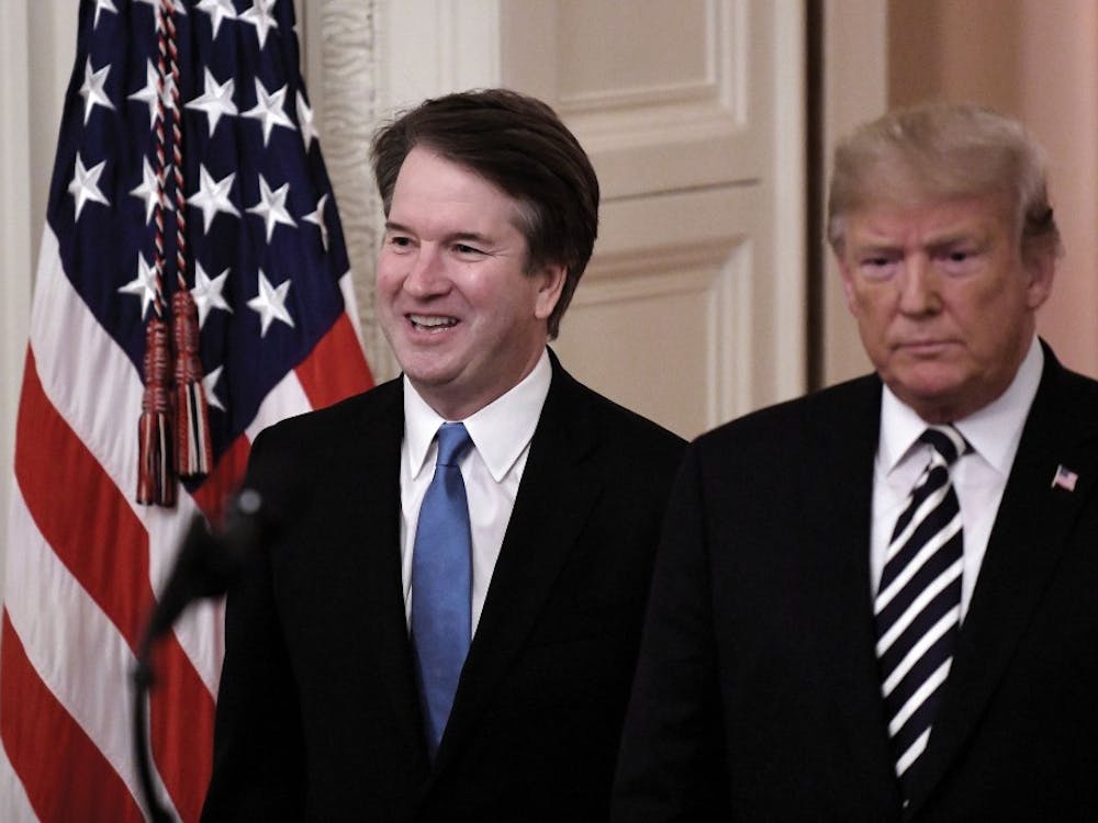 President Donald Trump, right, and Brett Kavanaugh, associate justice of the Supreme Court, arrive at a ceremonial swearing-in event in the East Room at the White House in Washington, D.C., on Monday, Oct. 8, 2018. Olivier Douliery/Abaca Press/TNS, PHOTO PROVIDED