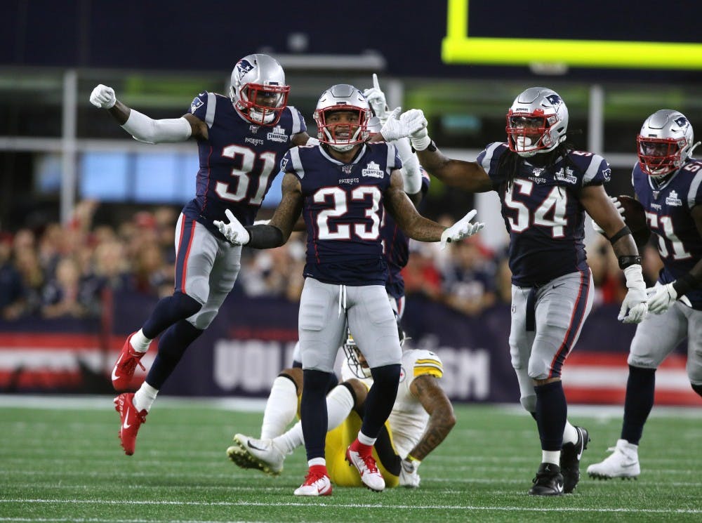 The Providence Journal/Bob Breidenbach and The New England Patriots host the Pittsburgh Steelers to start their 2019 season. and #23 Patrick Chung celebrates with teammates after he breaks up a pass in the 2nd quarter to #11 Donte Moncreif. (The Providence Journal/Bob Breidenbach/ TNS)