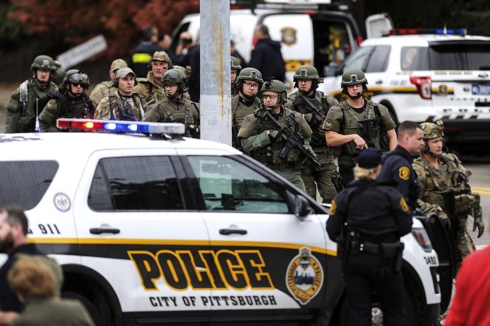 Law enforcement officers secure the scene where multiple people were shot, Saturday, Oct. 27, 2018, at the Tree of Life Congregation in Pittsburgh's Squirrel Hill neighborhood. (Alexandra Wimley/Pittsburgh Post-Gazette via AP)&nbsp;
