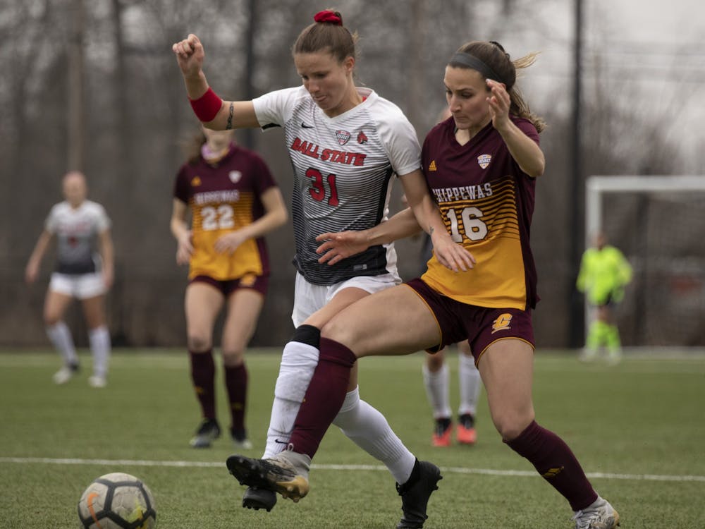 Cardinals junior midfielder Tatiana Mason and Chippewas senior defender battle for the ball March 26, 2021, at Briner Sports Complex. The Cardinals won 2-1 in overtime. Jacob Musselman, DN