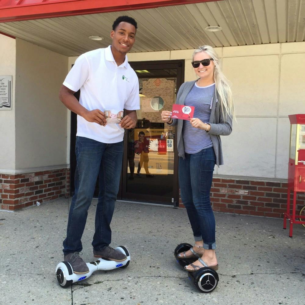 Chirpfest owner, Chris Cammack, poses on a Skywalker with Chirpfest promo model, Alexa Munger. PHOTO BY CHIRPFEST.
