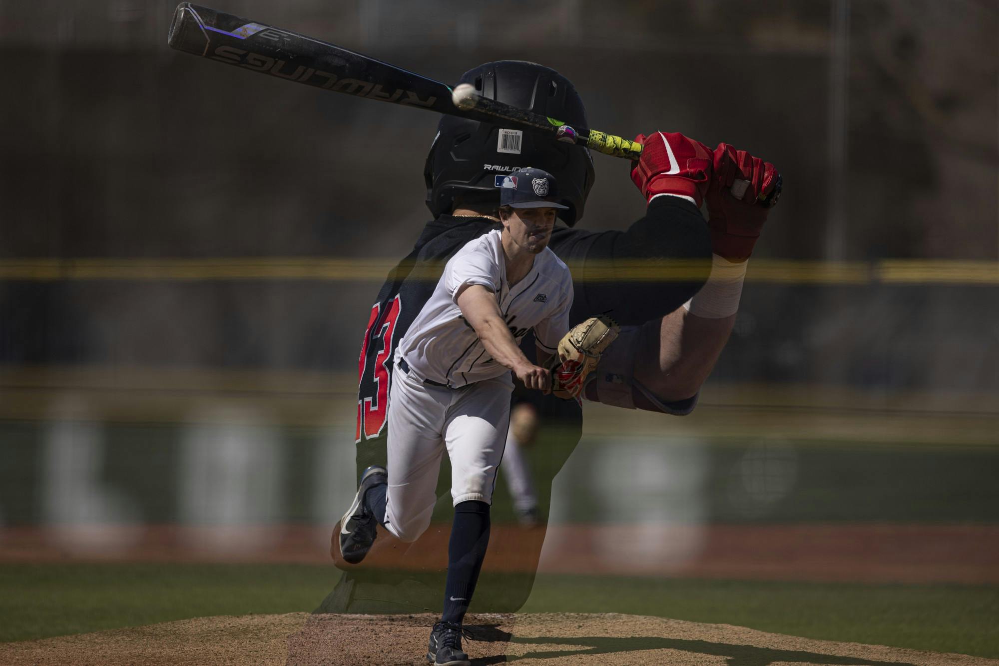 Bulldogs senior pitcher Jack Myers throws a pitch to Cardinals senior outfielder Ross Messina April 2, 2021, at Bulldog Park in Indianapolis, Indiana. The Cardinals beat the Bulldogs 7-2. Jacob Musselman, DN