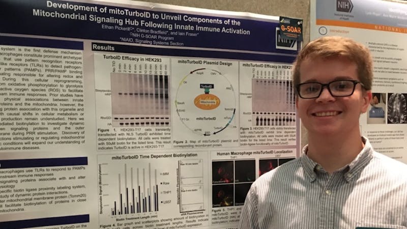 Ethan Pickerill stands in the Cooper Life Science Building on his way to do research. Pickerill researched cellular signaling within an immune cell during his time at the National Institute of Allergy and Infectious Diseases. Ethan Pickerill, Photo Provided