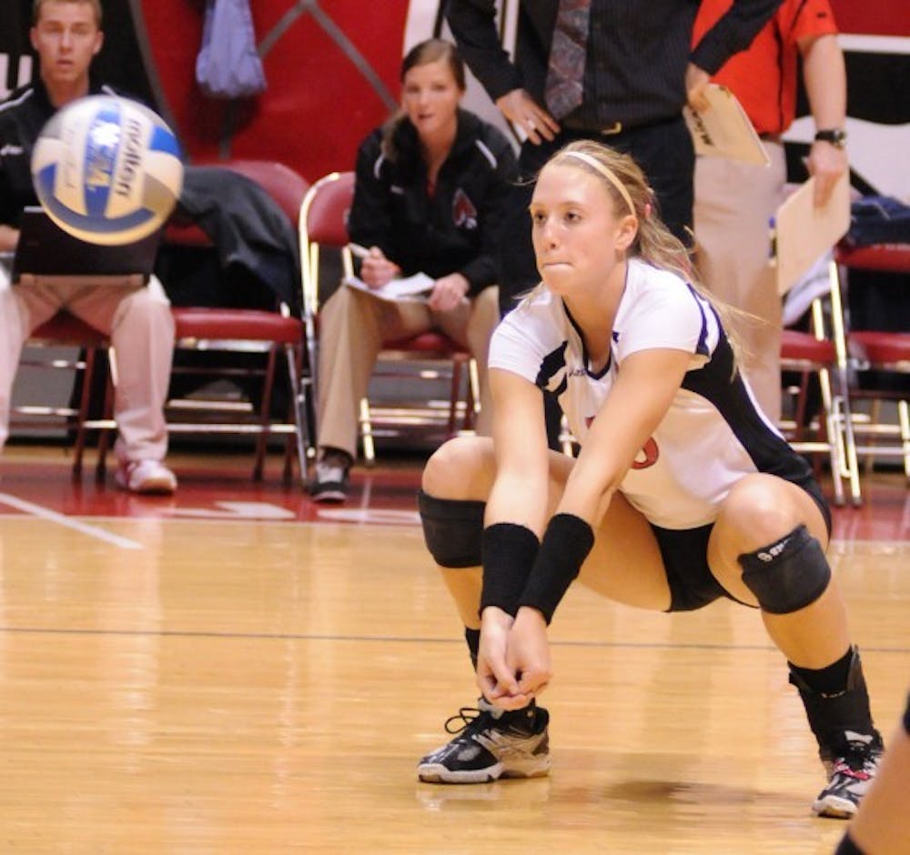 Freshman Catie Fredrich notches a dig against Kent State on October 16. Fredrich is one of many freshman making a major contribution to the Lady Cardinals' great season. DN FILE PHOTO JESSICA LANNING
