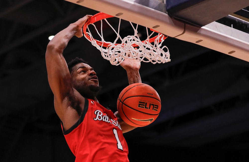 Junior guard Jermahri Hill dunks the ball against Dayton University Nov. 13 at Dayton, Ohio. Hill had 25 points for the Cardinals. Andrew Berger, DN 