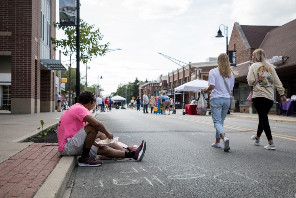 <p>A $2 Tour of the Village was held Aug. 24, 2019, in Muncie. A few of the businesses involved in the event included Brothers Bar &amp; Grill, Queer Chocolatier, White Rabbit Used Books, Roots Burger Bar and Art Mart. <strong>Eric Pritchett, DN</strong></p>