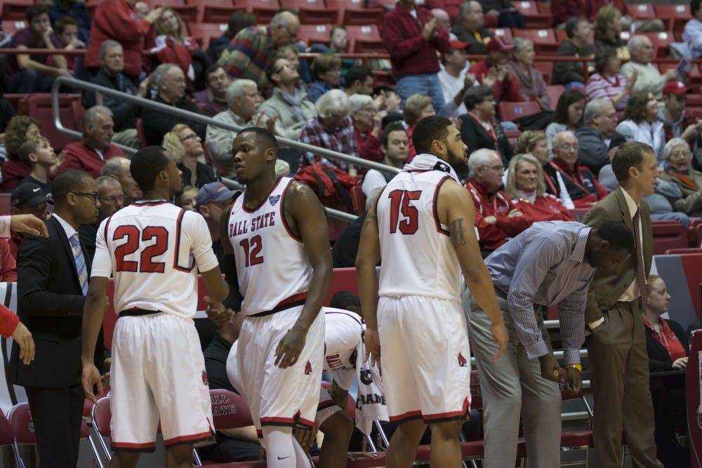 <p>Member's of the Ball State men's basketball team prepare to return to the floor after a timeout against Valparaiso on&nbsp;Nov. 28, 2015, at Worthen Arena. DN PHOTO AMER KHUBRANI</p>