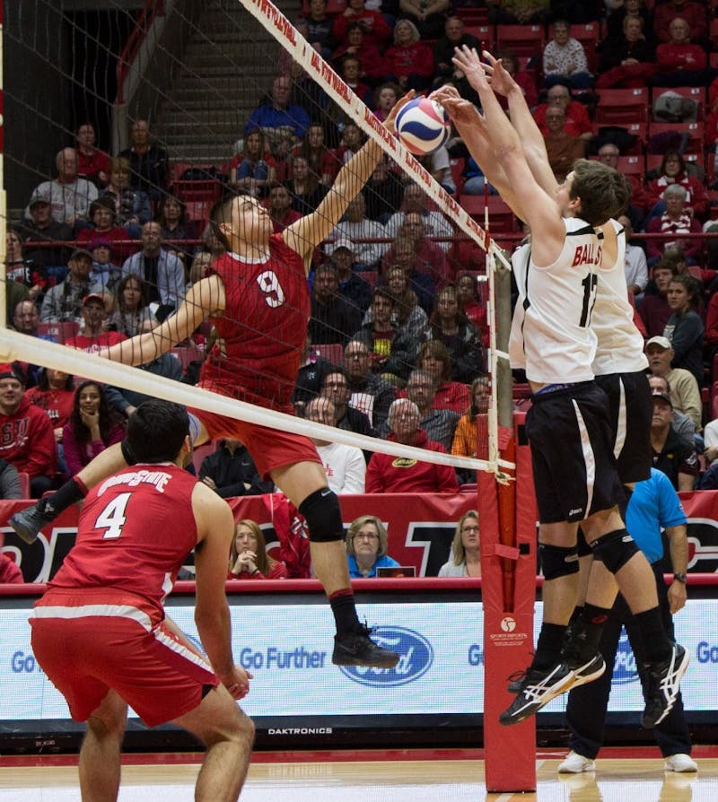 Seniors Alex Pia and Connor Gross block the ball at the game against Ohio State on Feb. 2 in Worthen Arena. The Cardinals lost 3-0 to the Buckeyes. Kaiti Sullivan // DN