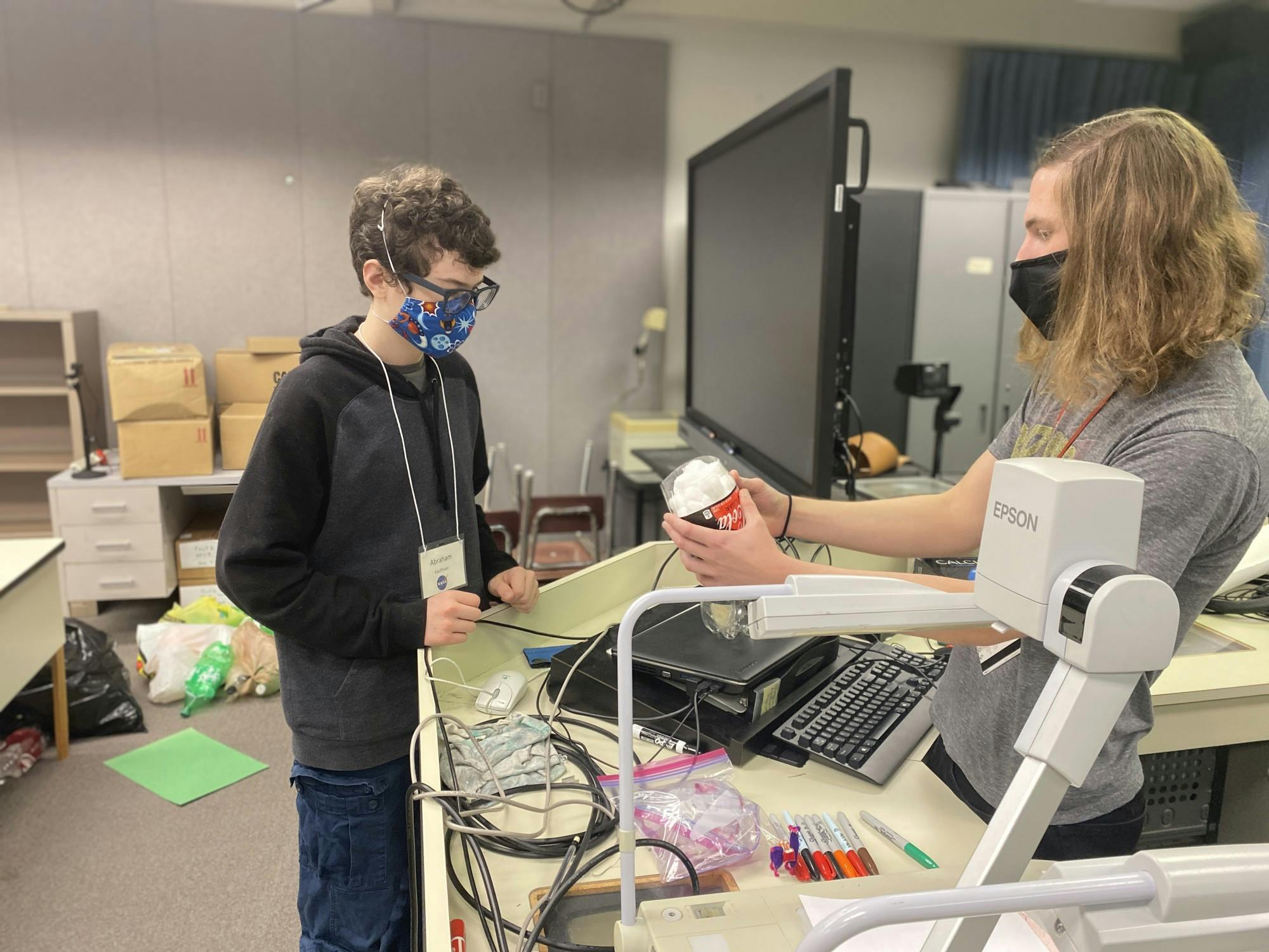 Michael Niemeier, Indiana Academy NASA summer camp instructor, helps a student build their prototype to live on Mars. Niemeier said he was most excited to see the ideas students come up with and share with each other during their time at the camp. Julie Tuttle-Davis, Photo Provided
