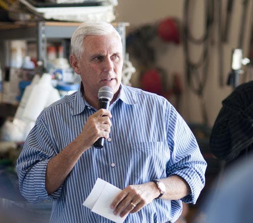 Then-Rep. Mike Pence talks to constituents about his endorsement of Brad Olivers on Oct. 4, 2012 at S.A. Boyce Corp. Pence’s inauguration today officially starts his term as governor of Indiana. DN FILE PHOTO JONATHAN MIKSANEK