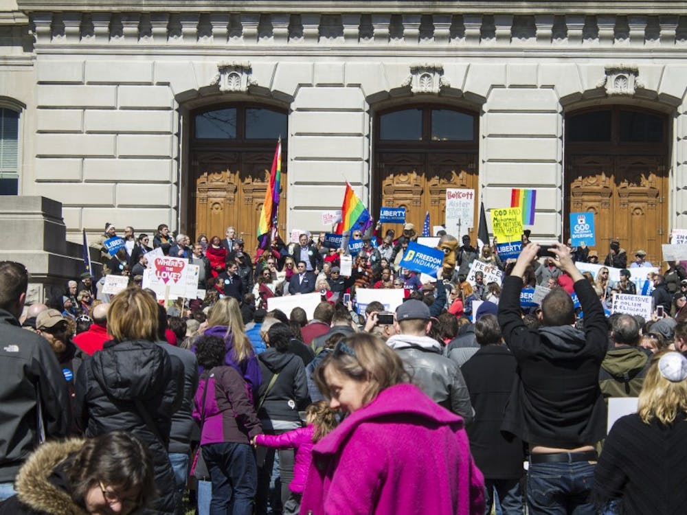 Protesters on the front steps of the Indiana Statehouse. | DN PHOTO BRADLEY DEAN JONES