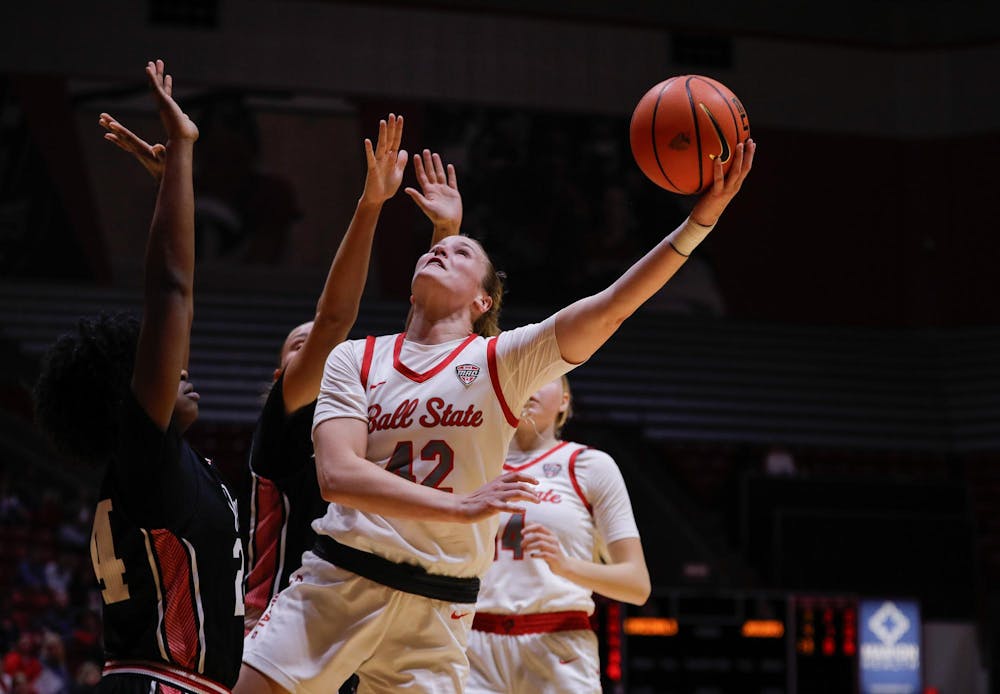 Graduate student Elise Stuck jumps for a layup against IU Indianapolis Nov. 8 at Worthen Arena. Stuck had eleven points in the game. Andrew Berger, DN 