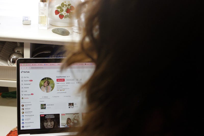 Kat Hawthorne, a second-year acting major at Ball State University, sits in front of her laptop maintaining her TikTok profile Jan. 10 at her apartment on Neely Street, Muncie. Hawthorne, a content creator, said she is disheartened by the platform's ban because "As far as the reception I get on social media, TikTok is by far the nicest." Katherine Hill, DN