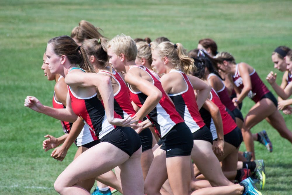 Team members take off at the start of the cross country meet against IUPUI on Sept. 23, 2016 at the Muncie Elks Country Club.  Ball State won against IUPUI 16-46. Kaiti Sullivan // DN