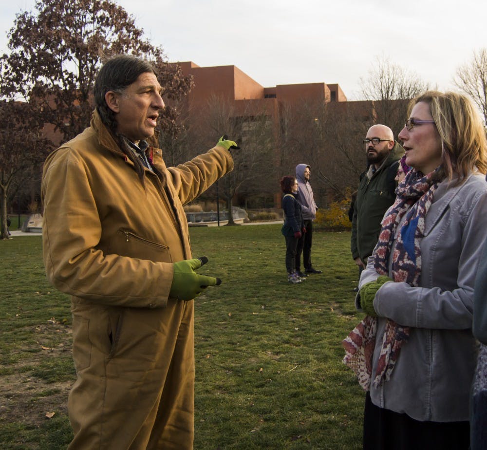 Ball State alumnus Stacey Stinson and Kelli Huth, director of immersive learning for entrepreneurial learning, discuss the crisis of the Dakota Access Pipeline on Dec. 4, 2016, at the University Green. Teri Lightning Jr., DN