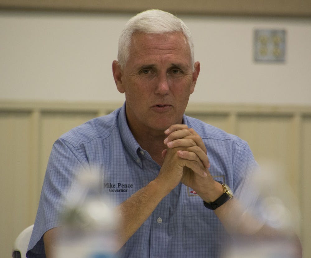 Indiana Governor Mike Pence visited the Delaware County Fairgrounds on July 13 to host an agricultural roundtable discussion with community leaders. With Pence in contention to become presidential candidate Donald Trump's running mate, reporters nearly outnumbered attendees in the Heartland Hall Meeting Room. DN PHOTO SAMANTHA BRAMMER