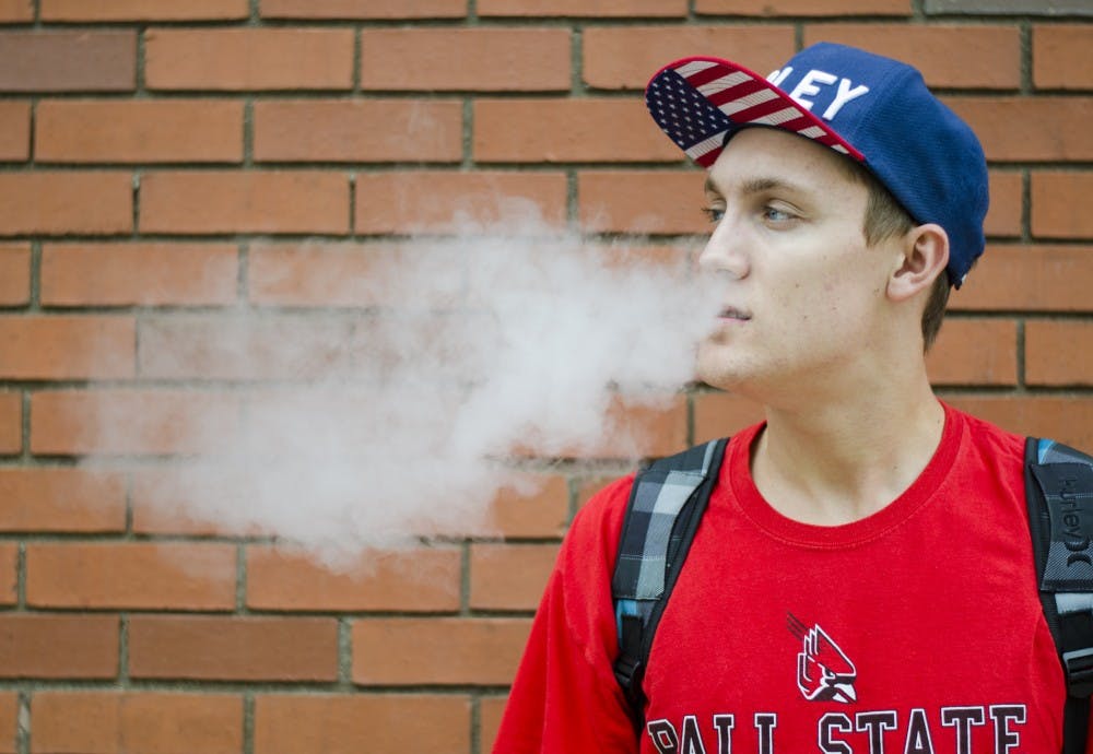 Vaping, a safer alternative to smoking, involves inhaling water vapor through a vaporizer. Sophomore telecommunications major Bryce Chudzicki started vaping after his friends offered to let him try, and he ended up liking it for the taste. DN PHOTO BREANNA DAUGHERTY