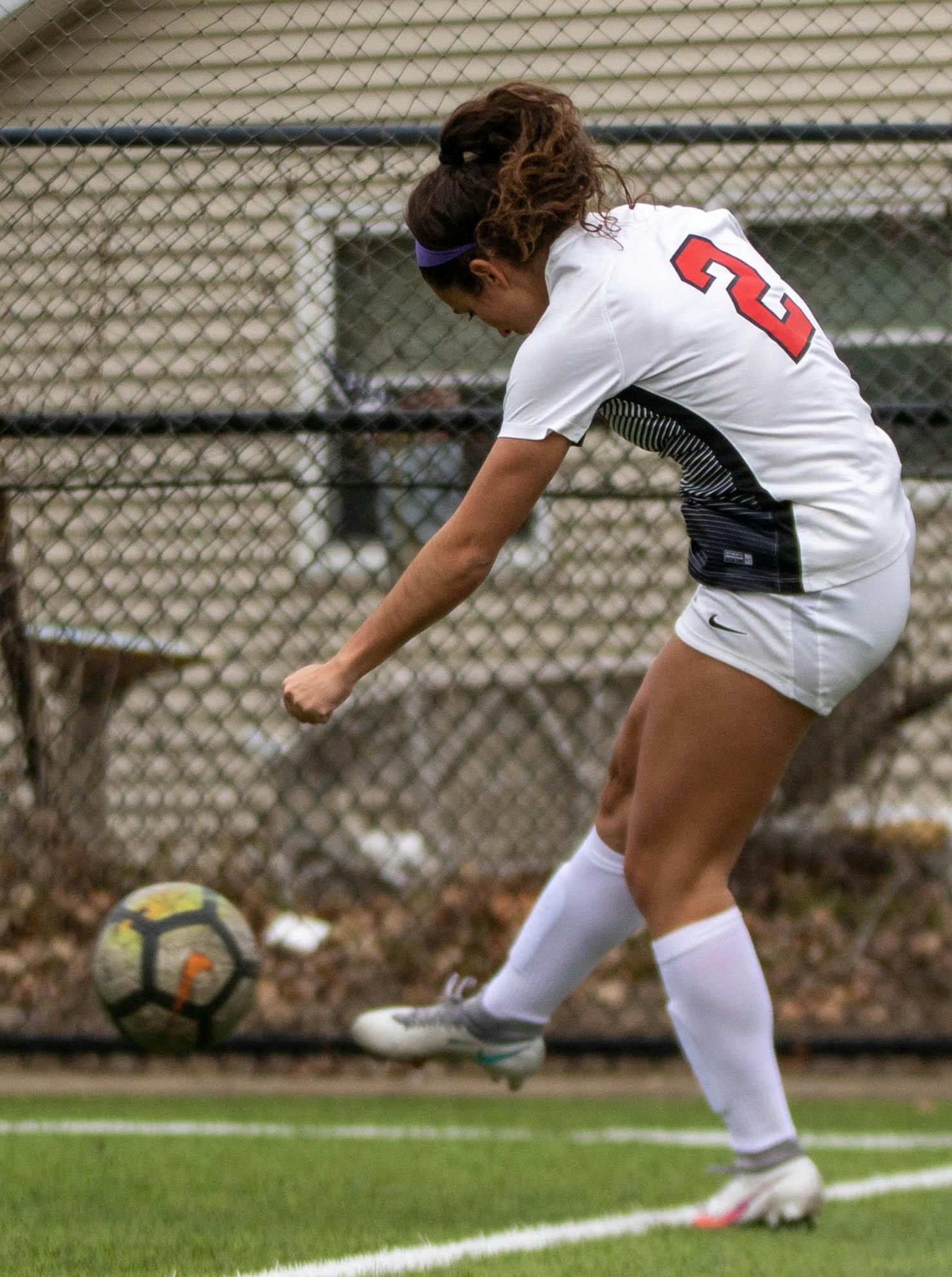 Redshirt junior Lizzie Philiban saves the ball from going out of bounds March 12, 2021, at Briner Sports Complex. The Cardinals tied at zero in double overtime against the Broncos. Jaden Whiteman, DN