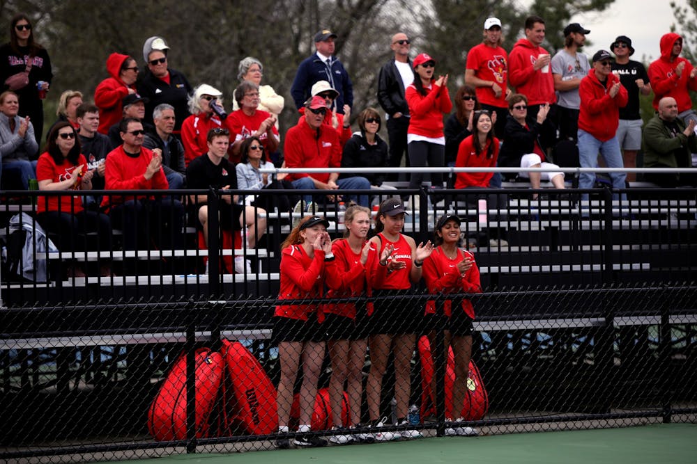 <p>The Ball State Women&#x27;s Tennis teams cheers when a point is scored in a MAC Championship doubles match against Toledo May 1 at Cardinal Creek Tennis Courts. Amber Pietz, DN</p>