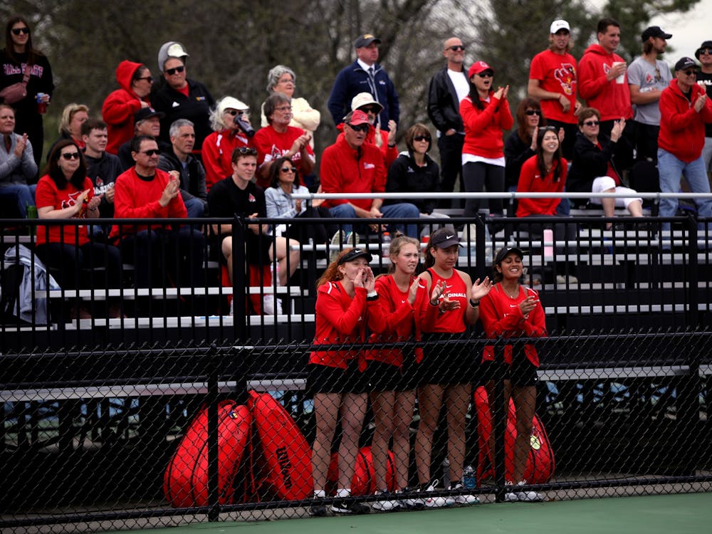 The Ball State Women&#x27;s Tennis teams cheers when a point is scored in a MAC Championship doubles match against Toledo May 1 at Cardinal Creek Tennis Courts. Amber Pietz, DN