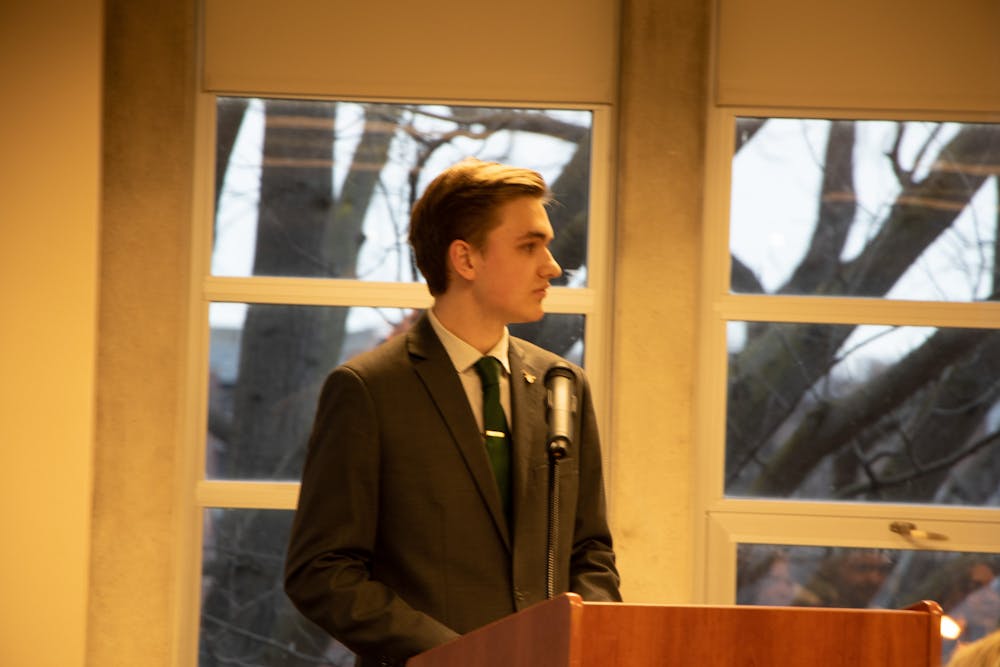 <p>Student Government Association Presidental Nominee Joseph Gassensmith listens to opposing Presidental Nominee Skylar Ellis﻿ discuss her platform points. Gassensmith is running on the &quot;Gassensmith &amp; Lindstrand&quot; ticket and Ellis is running on the &quot;Empower&quot; ticket. Hannah Amos, DN</p>