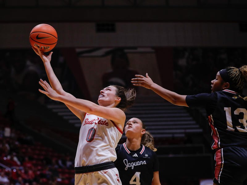 Senior Ally Becki puts the ball up for two against IU Indianapolis Nov. 8 at Worthen Arena. Becki had 21 points in the game. Andrew Berger, DN 