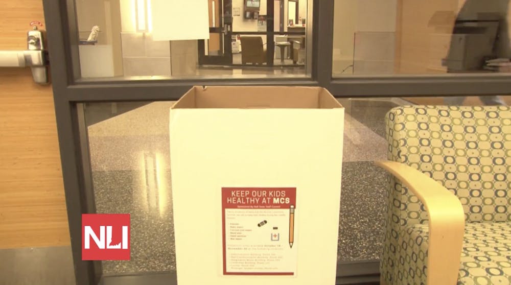 The Ball State Staff Council collects donations for Muncie Community Schools
