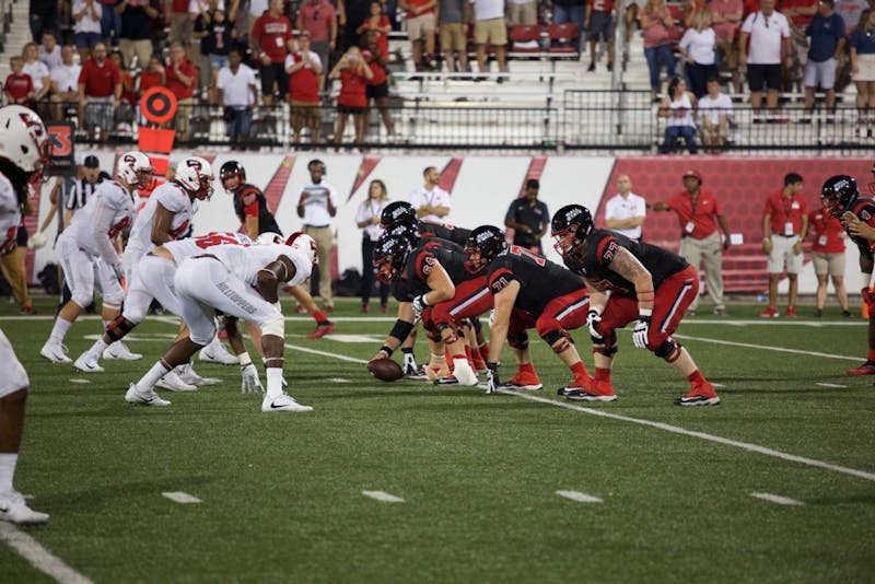 Ball State offensive lines up to snap the ball on Sept. 23 at Western Kentucky University's Houchens Industries-L.T. Smith Stadium. Ball State plays Western Michigan on Saturday. Rebecca Slezak, DN