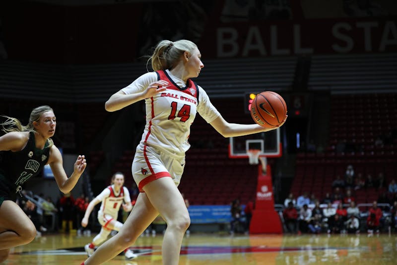Junior Marie Kiefer catches a pass from her teammate against Ohio Feb. 3 at Worthen Arena. Kiefer scored 10 points in the game. Mya Cataline, DN