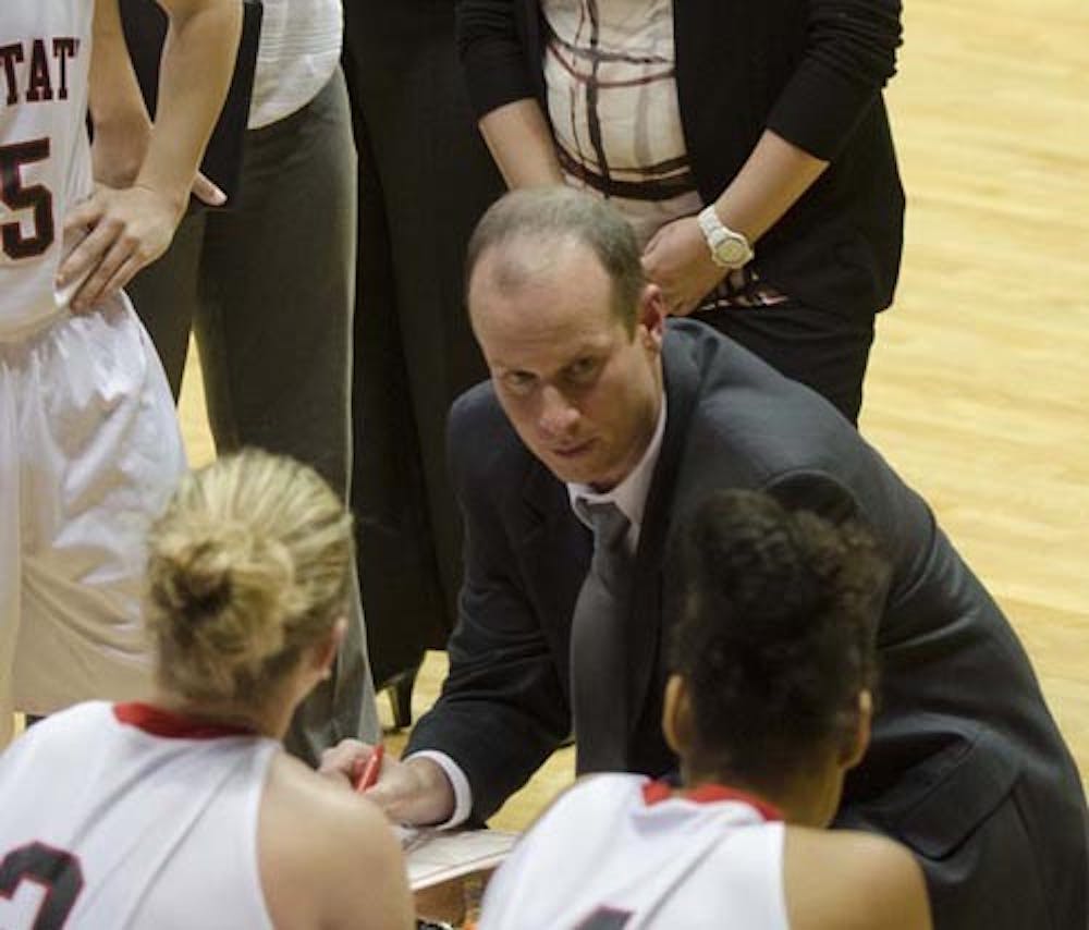 Women’s basketball head coach Brady Sallee talks to the team during a time out in the game against Oakland City on Oct. 31, 2012. Ball State has lost seven of their last eight games, heading into Mid-American Conference play. DN FILE PHOTO COREY OHLENKAMP