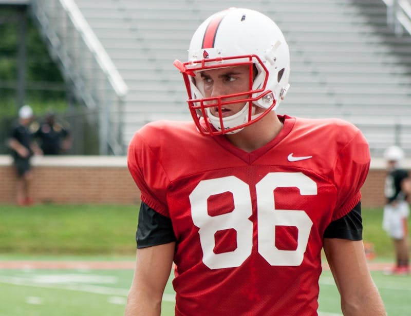 Redshirt sophomore wide reciever Riley Miller walks across the field after drills.  Wide reciever coach Alex Bailey expects Miller to play often this season. Kaiti Sullivan // DN