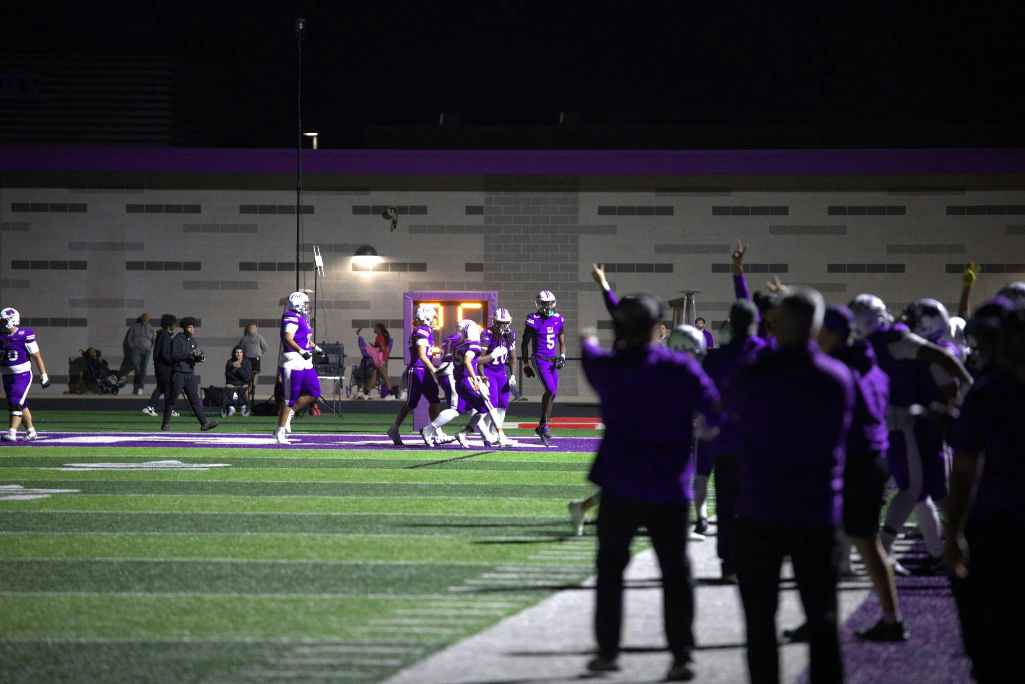 The stadium erupts on a Dae’cion Echols touchdown run early in the 4th quarter. The touchdown gives Muncie Central a 12-7 lead. Photo by Chris McCalla