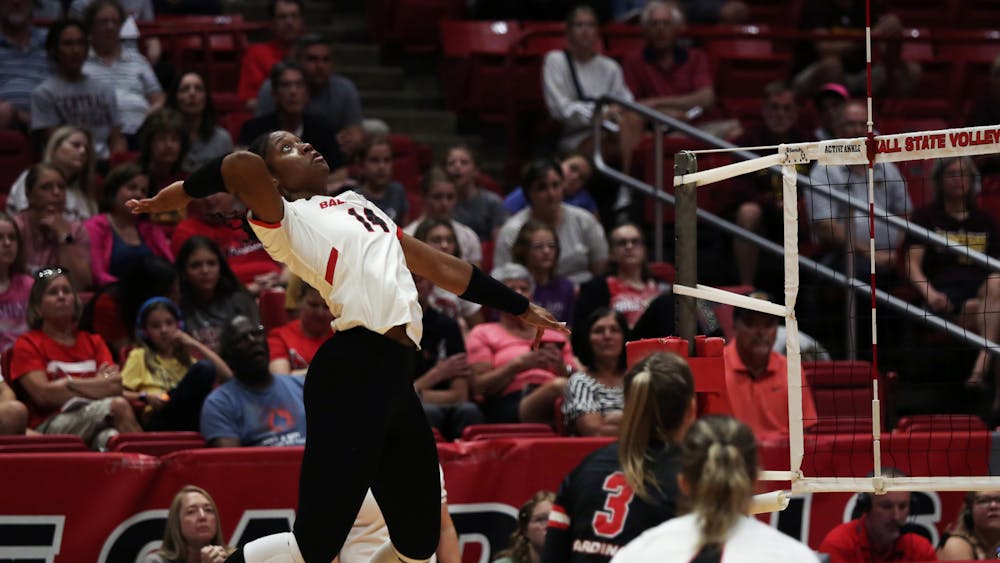 Redshirt freshman middle blocker Aniya Kennedy spikes the ball over the net against Central Michigan Sept. 22 at Worthen Arena. Kennedy scored 13 points in the game. Mya Cataline, DN
