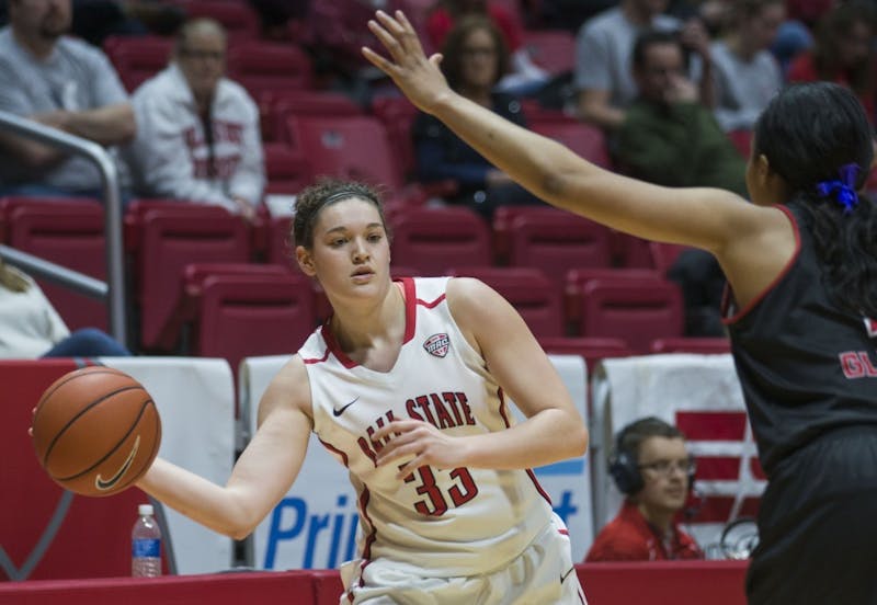 Junior forward Moriah Monaco attempts to pass the ball at the game against Northern Illinois University on Jan. 28 in Worthen Arena. The cardinals lost 101-96. Breanna Daugherty // DN
