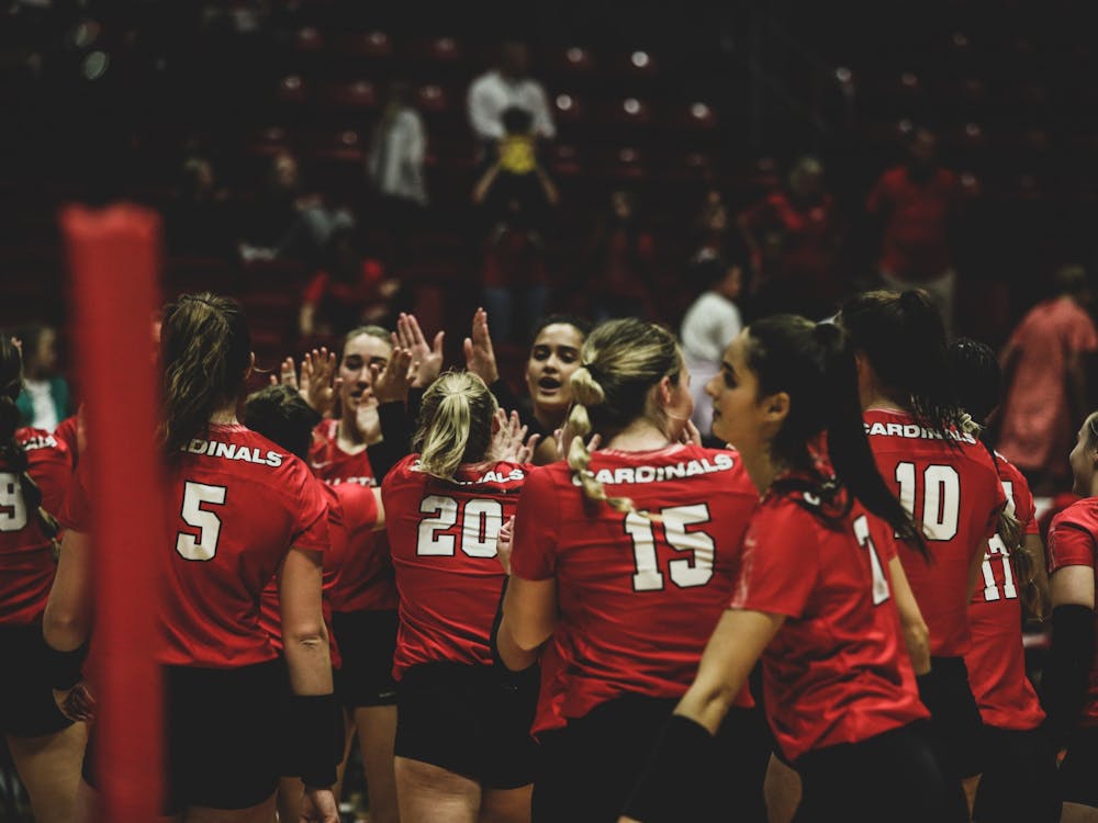 The Ball State women’s volleyball team giving high-fives to each other  to celebrate their win against the Eastern Michigan on Sep. 30 at Worthen arena in Muncie, Indiana. Eve Green, DN