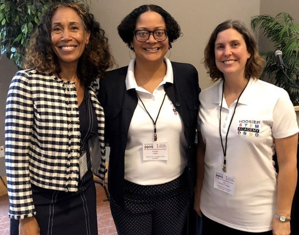 <p>Tamara Markey, Indiana teacher of the year 2019, Kizmin Jones, director of Hoosier STEM Academy, and Jill Bradley-Levine, associate professor of educational studies, pose for a photo at the Hoosier STEM Conference June 17, 2019. The academy was awarded $602,000 by the Indiana Commission for Higher Education. <strong>Kizmin Jones, Photo Provided</strong></p>