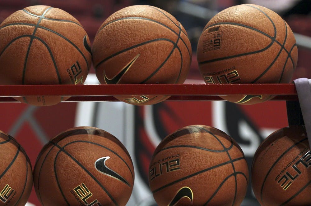 <p>Basketballs sit in a rack while Ball State warms up before the second half of the Cardinals' game against Cleveland State University Nov. 11, 2018 in John E. Worthen Arena. Ball State won 67 to 62. <strong>Paige Grider, DN</strong></p>