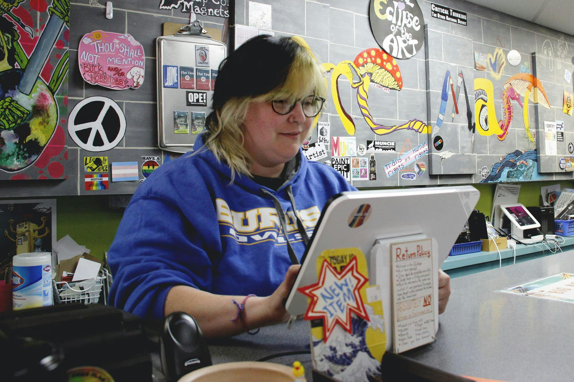 Art Mart general manager Elizabeth "Beth" McCollum works at the counter in Art Mart Sept. 4 in Munice Ind. Beth said she is excited to own the business after her mother's retirement from the shop. Katherine Hill, DN