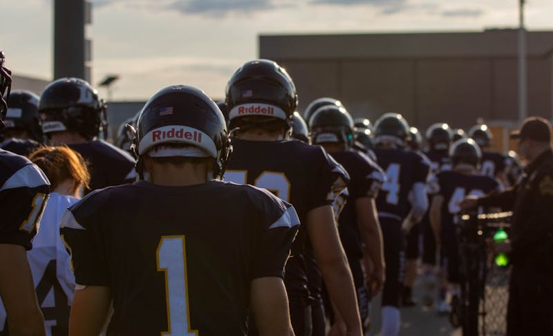 The Delta Eagles walk toward their locker room before the start of their game with the Muncie Central Bearcats Aug. 23, 2019. The Eagles won the game, 42-0. Jacob Musselman, DN