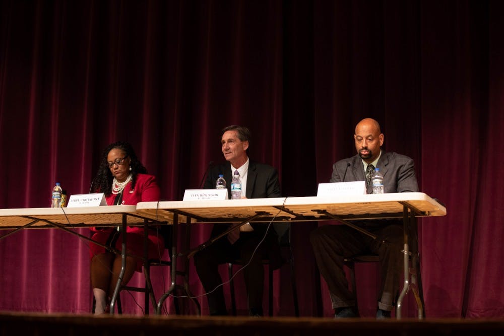 The three Muncie mayoral candidates, (left to right) Terry White Bailey, Dan Ridenour and Steve Smith answered questions from the audience, Sept. 26, 2019, at the Muncie Central Auditorium. Panelists had to answer questions in under a minute time limit. Jacob Musselman, DN