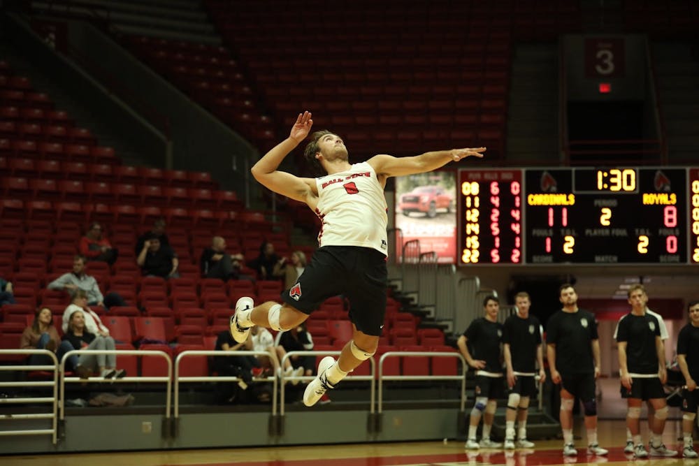 <p>Senior outside attacker Blake Reardon jumps to serve the ball Jan. 11 in John E. Worthen Arena. Ball State defeated Queens, 3-0. <strong>Jacob Musselman, DN</strong></p>